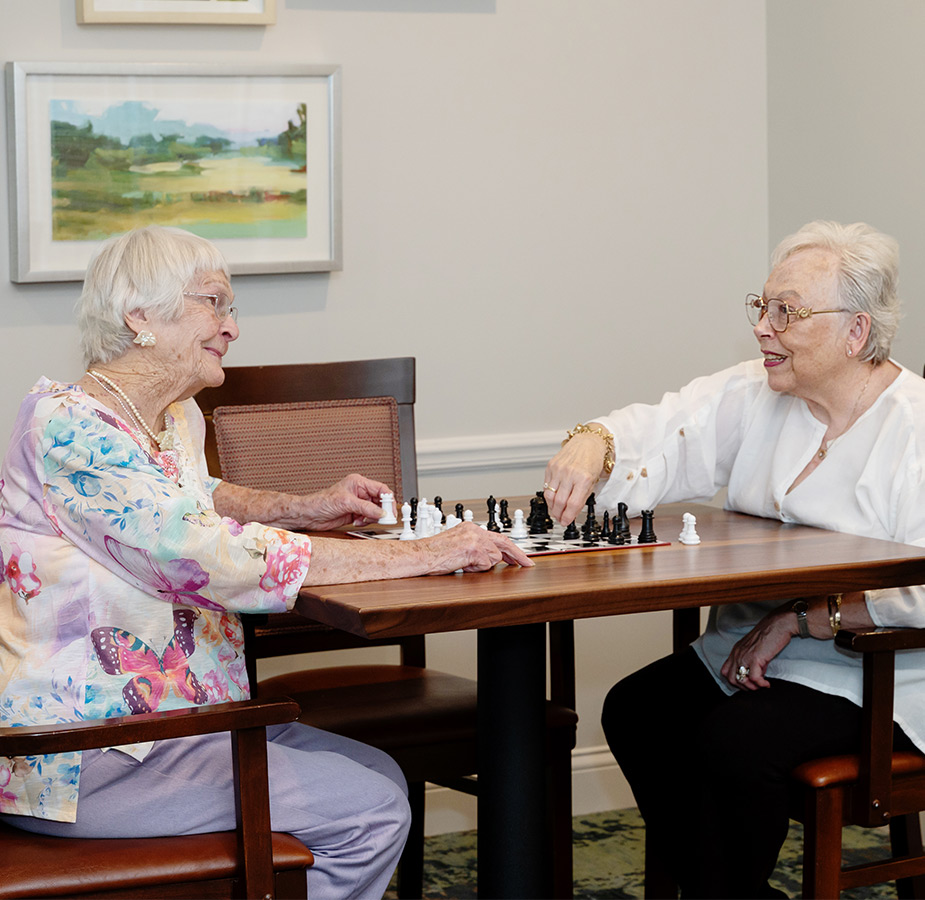Two people playing chess.