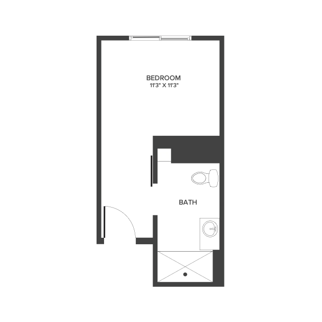 A memory care studio suite floor plan with an open living/bedroom space.