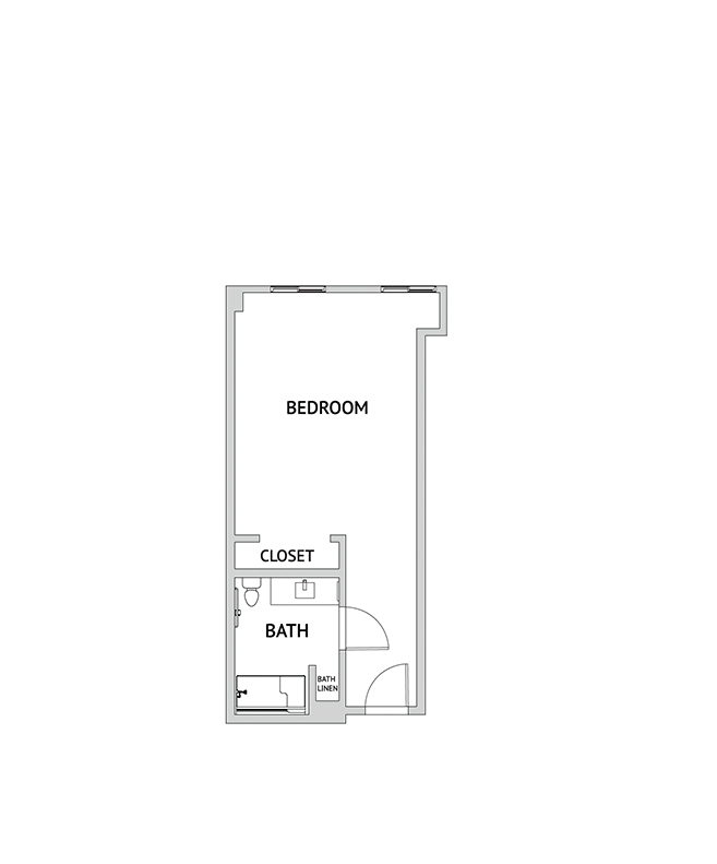 A memory care studio suite floor plan with an open living/bedroom space.