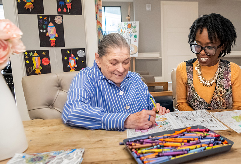 Residents playing in a creative activity.