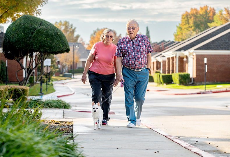 Residents walking down a path.
