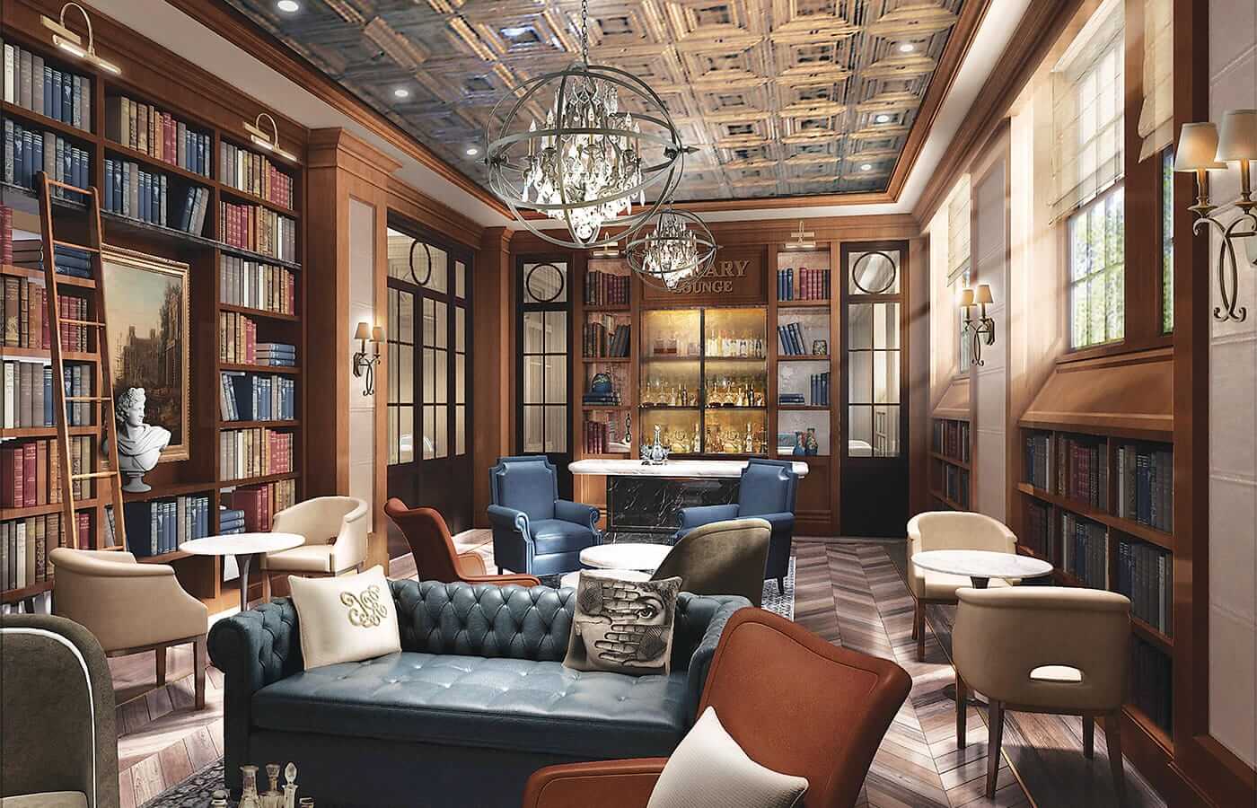 The indoor library and wine bar found within the walls of The Watermark at Brooklyn Heights showcasing a fully stocked bar, numerous books and a variety of seating.