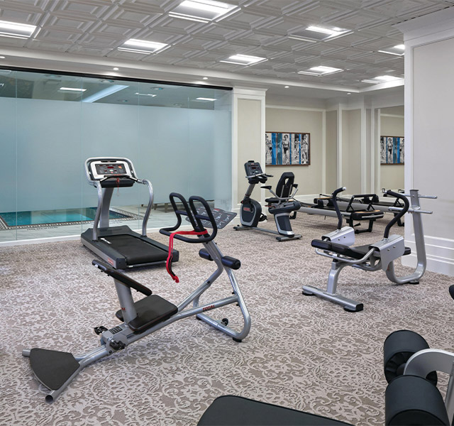 Fitness room with equipment.