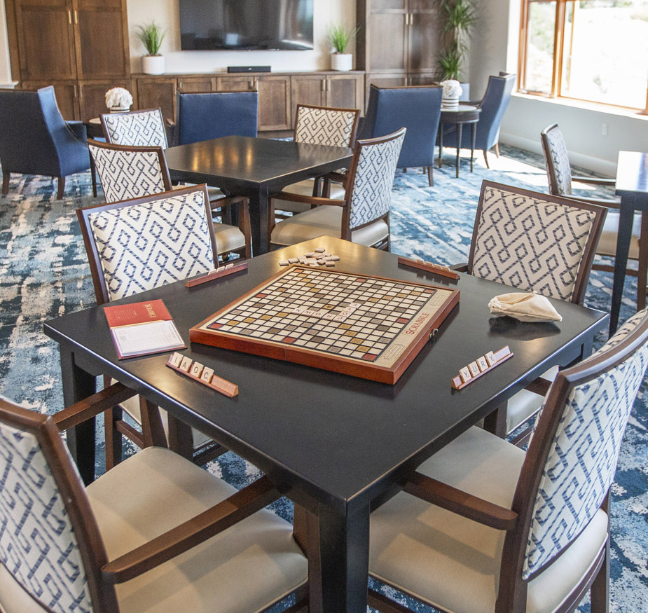 A Scrabble board on a table.