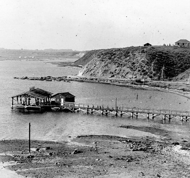 A black and white photo of a beach nearby.