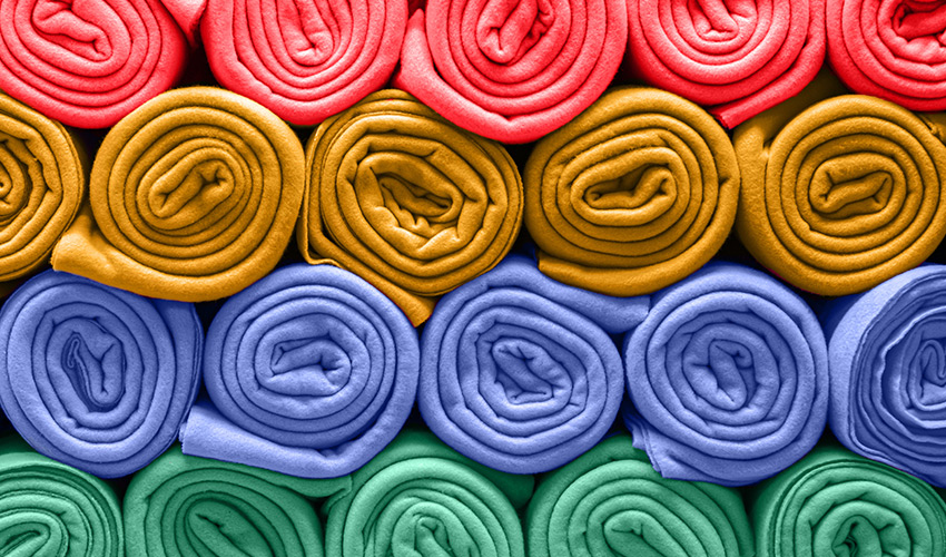 Rolls of colorful fleece fabric.
