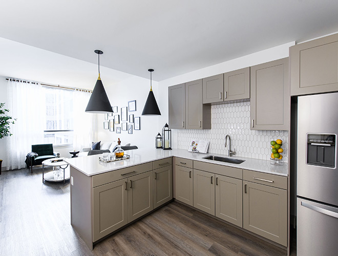 A kitchen in an apartment at The Watermark at Houston Heights.