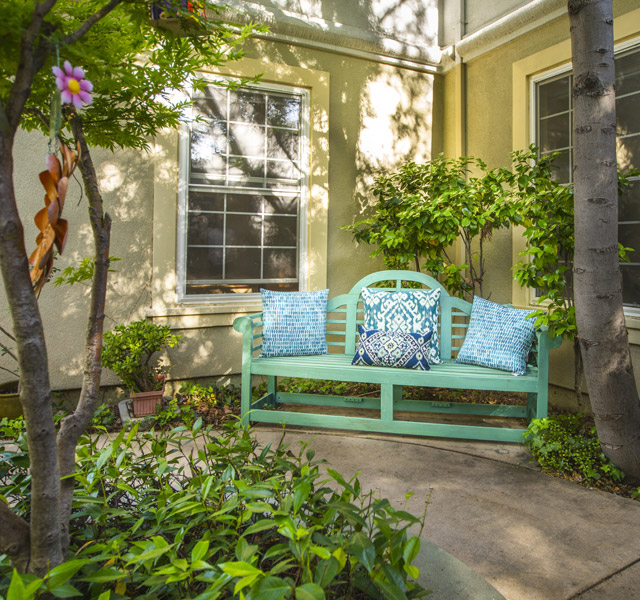 Turquoise bench in garden