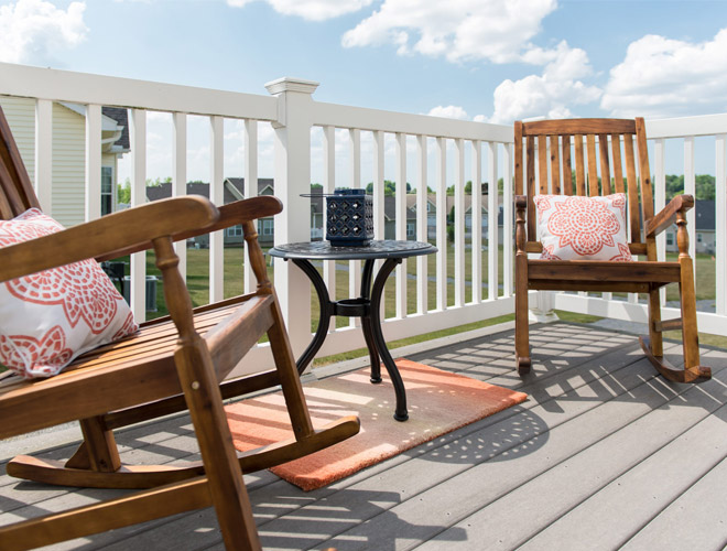 Rocking chairs on a porch.