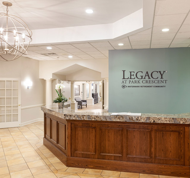 The front desk in the lobby of The Legacy at Park Crescent.