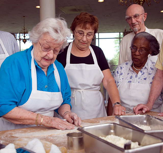 Residents enjoying an cooking class.