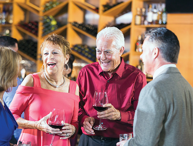 Residents are having glasses of wine together.