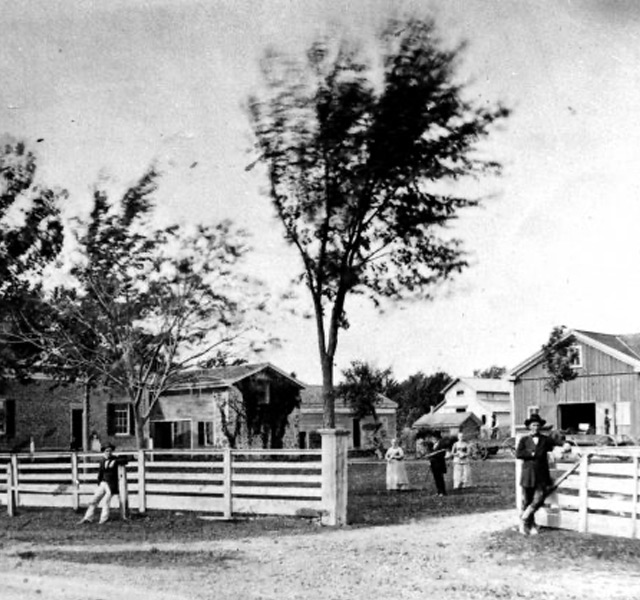 A black and white photo of historic buildings.