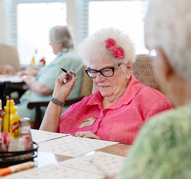 A resident is playing bingo.