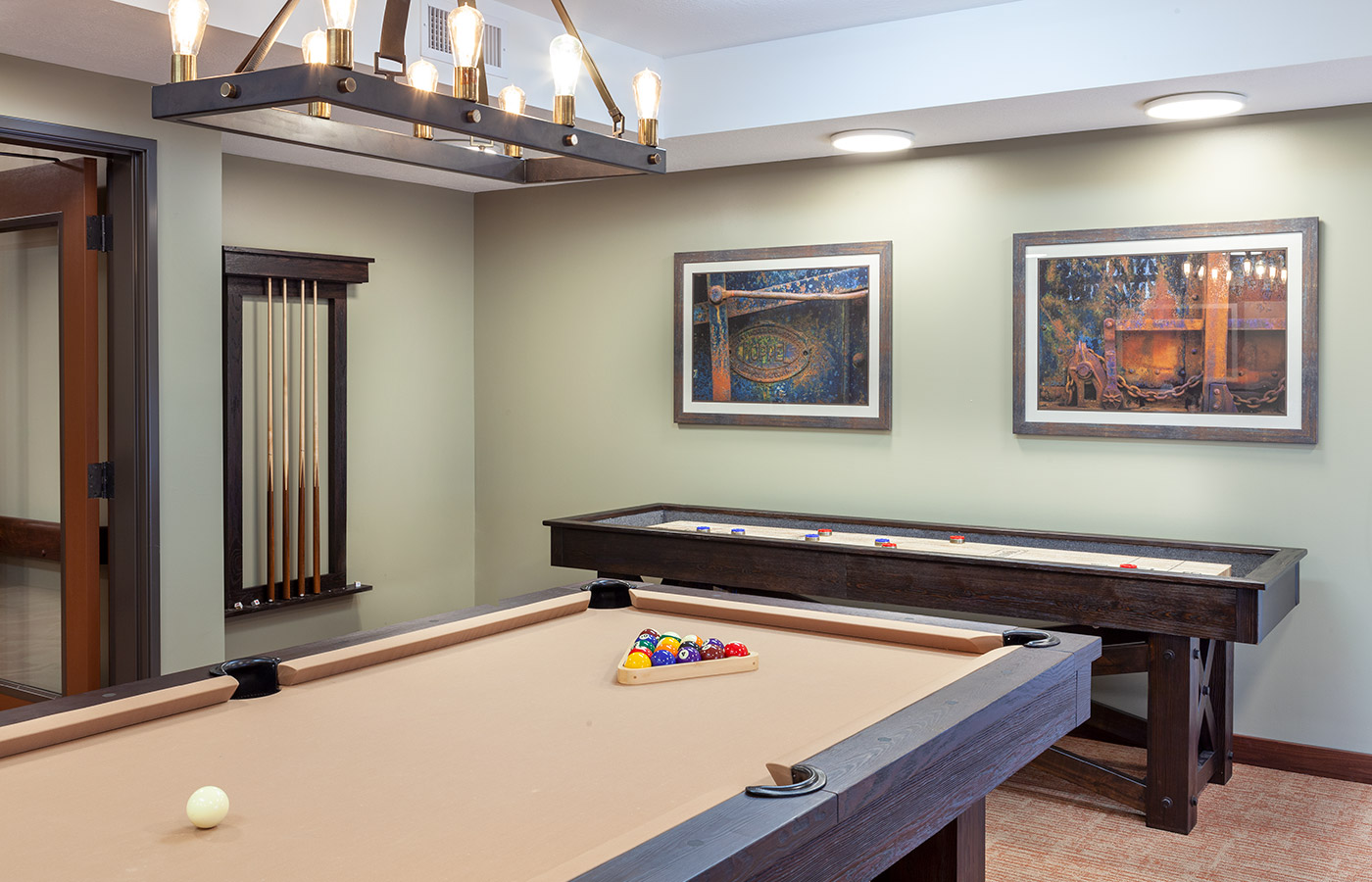 Pool table in game room.