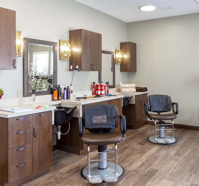 Hair stations at salon.