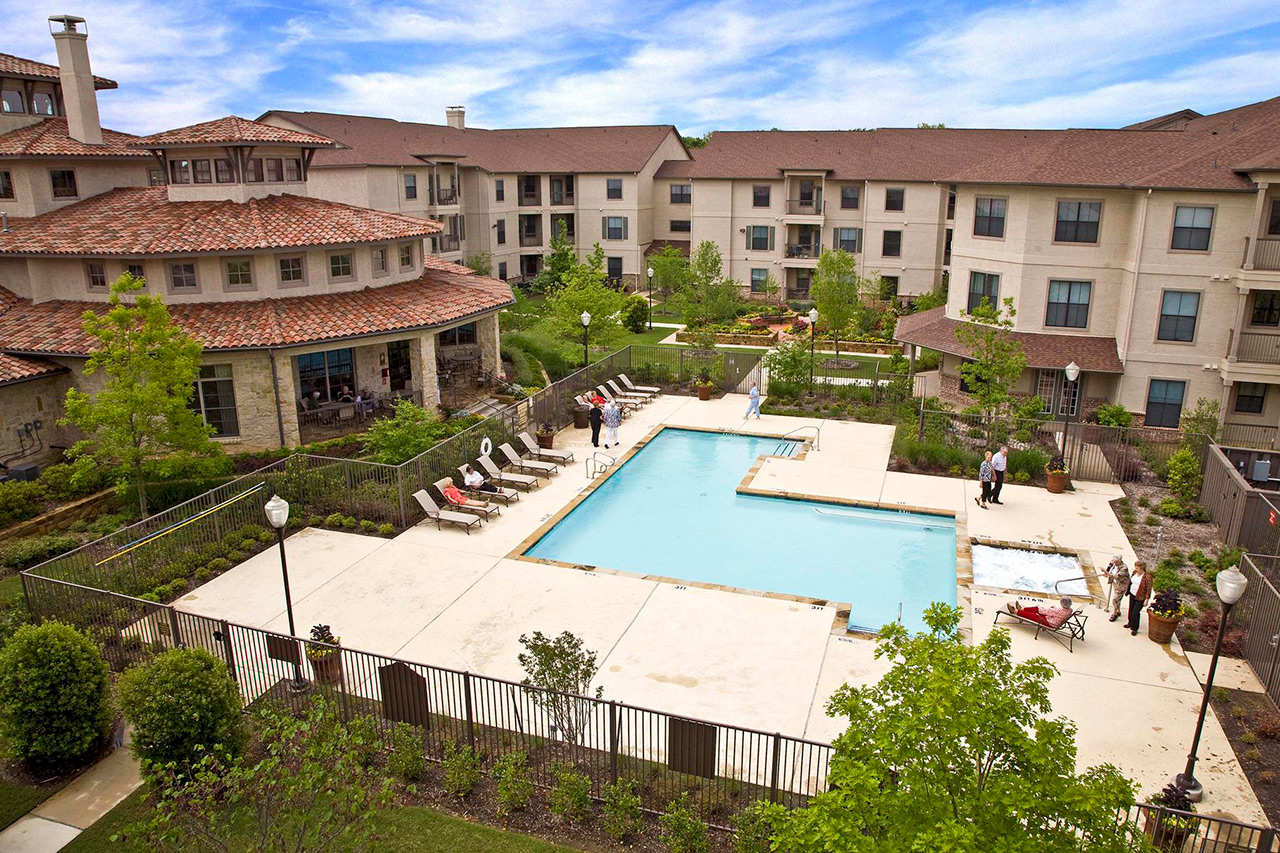 Parkview in Frisco building with pool.