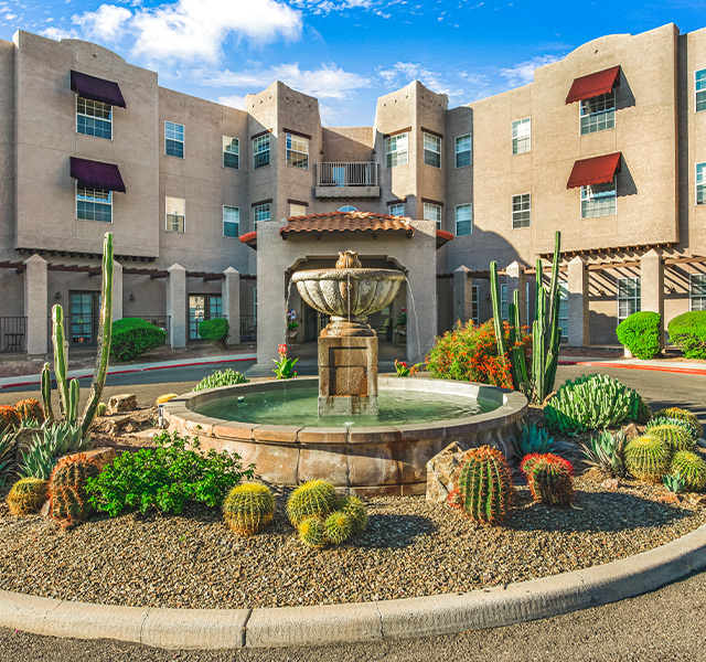 Parkview in Frisco building entrance with a water fountain.