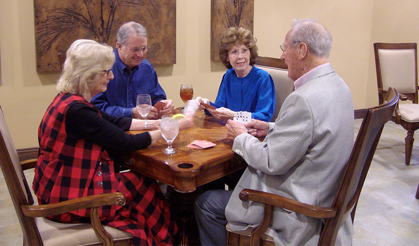 A group of residents playing cards.