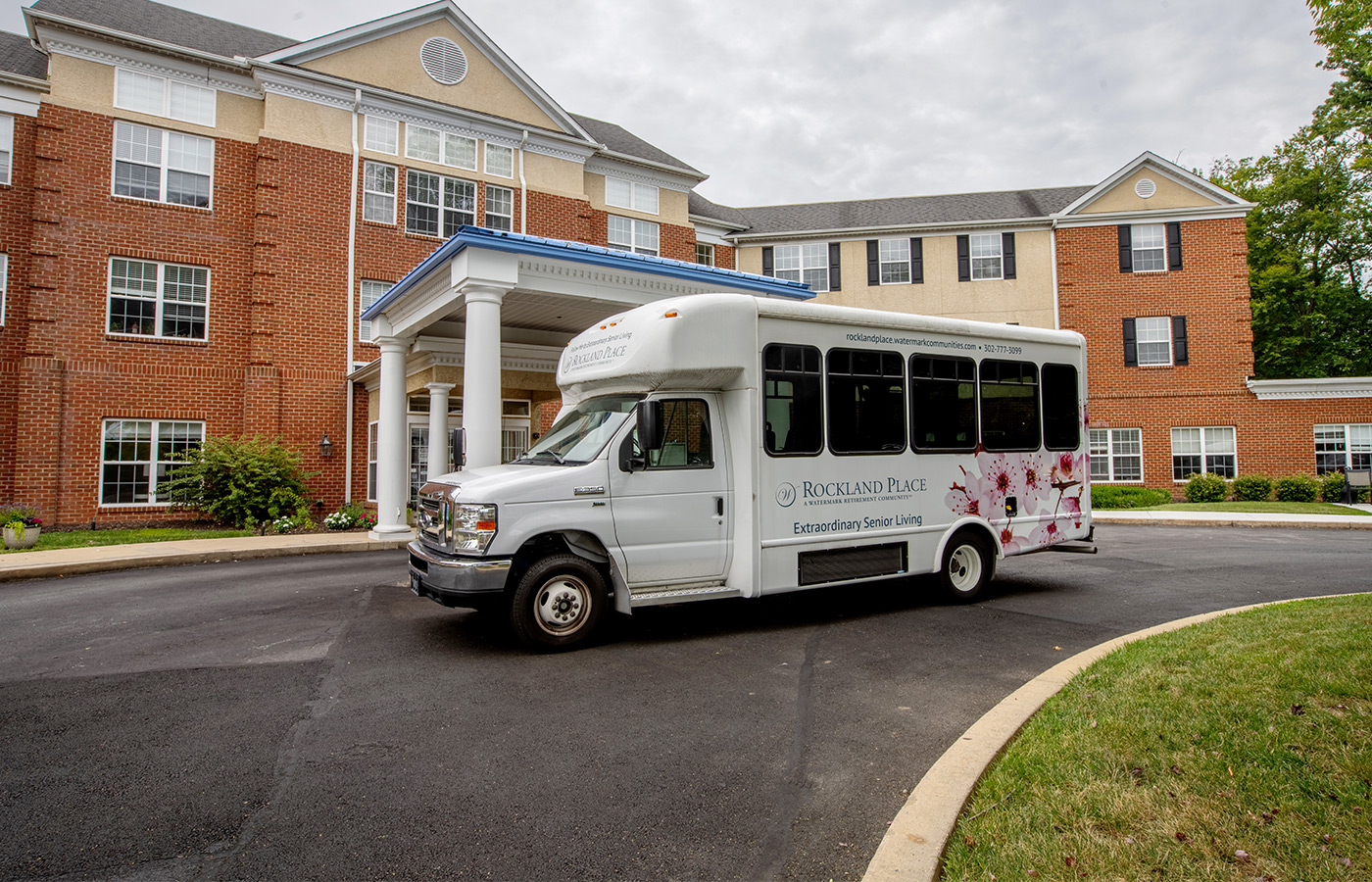 A shuttle bus outside the building exterior.