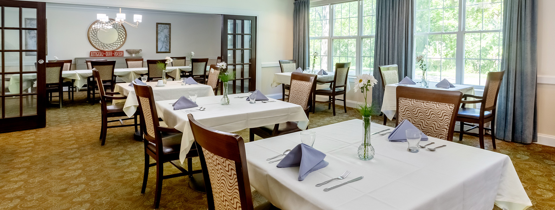 A dining room set for service.