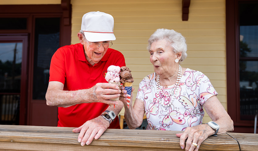 Two people eating ice cream.