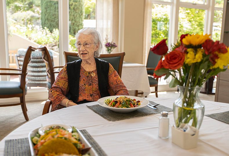 Residents are having a meal together.