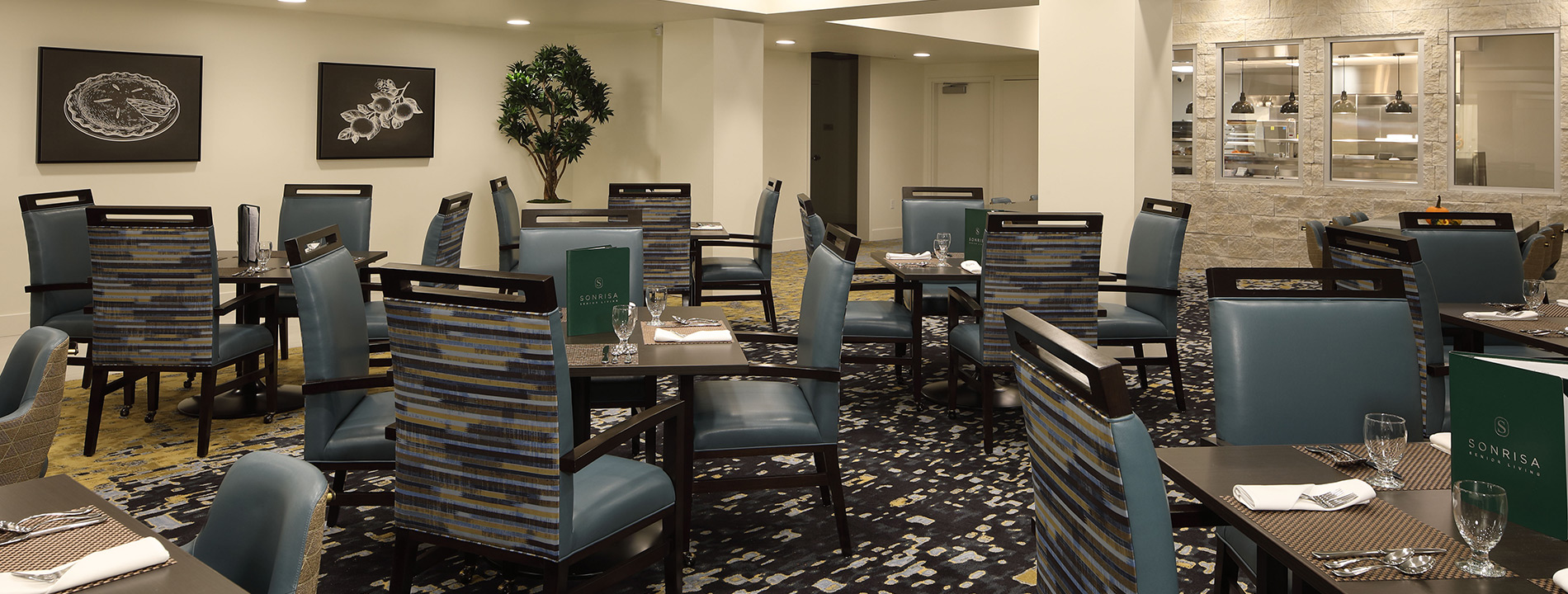 A dining room ready for dinner.