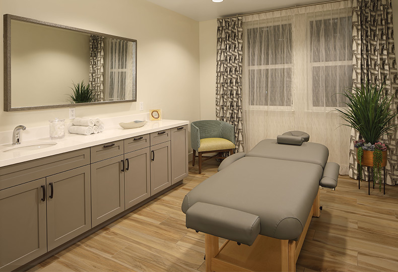 A spa with a massage table.