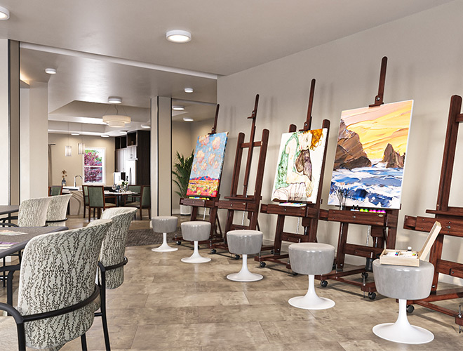 art displayed on easels in an activity room