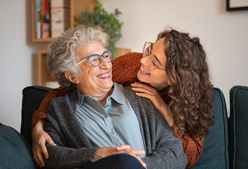 caregiver embracing a resident