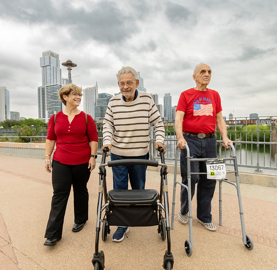 A group walking on the Pfluger Bridge.