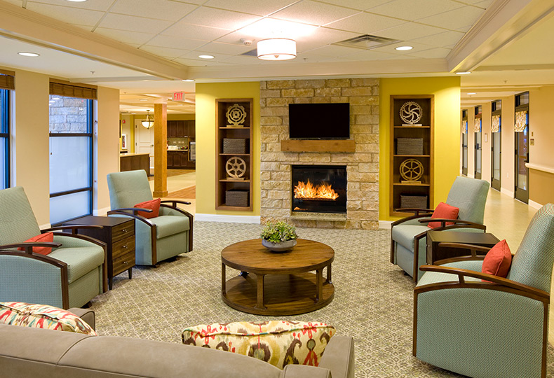 Seating area by a fireplace.