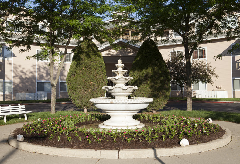 A fountain in a courtyard at The Fountains at Greenbriar.