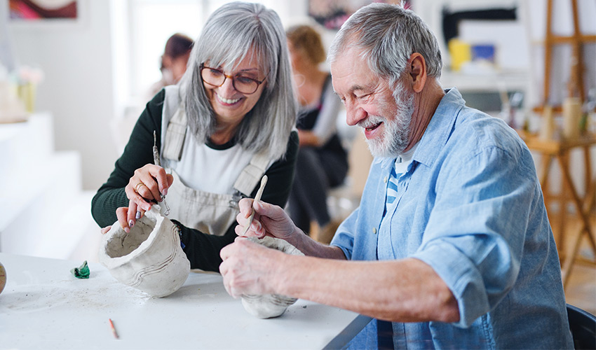 People in a pottery class.