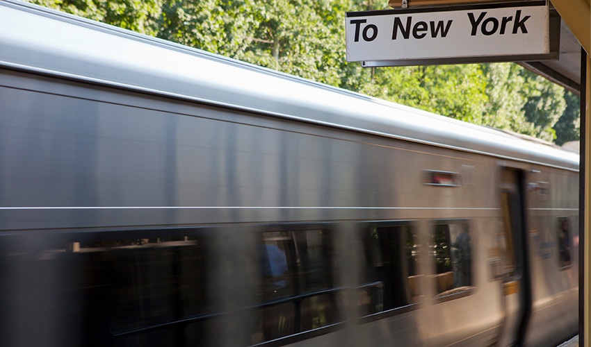 train with sign saying to new york