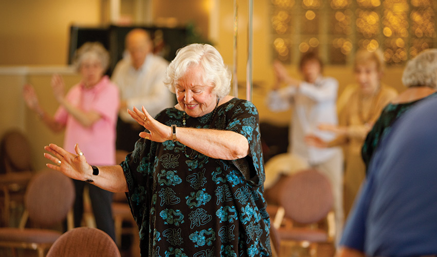 A woman dancing in a class.