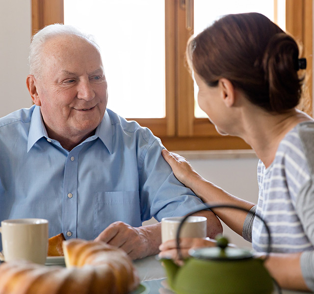 A resident with their caregiver.