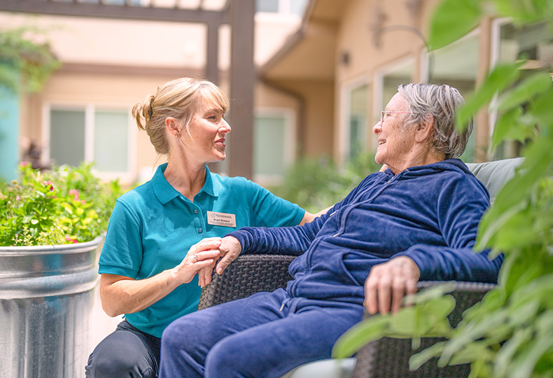 A resident with their caregiver.