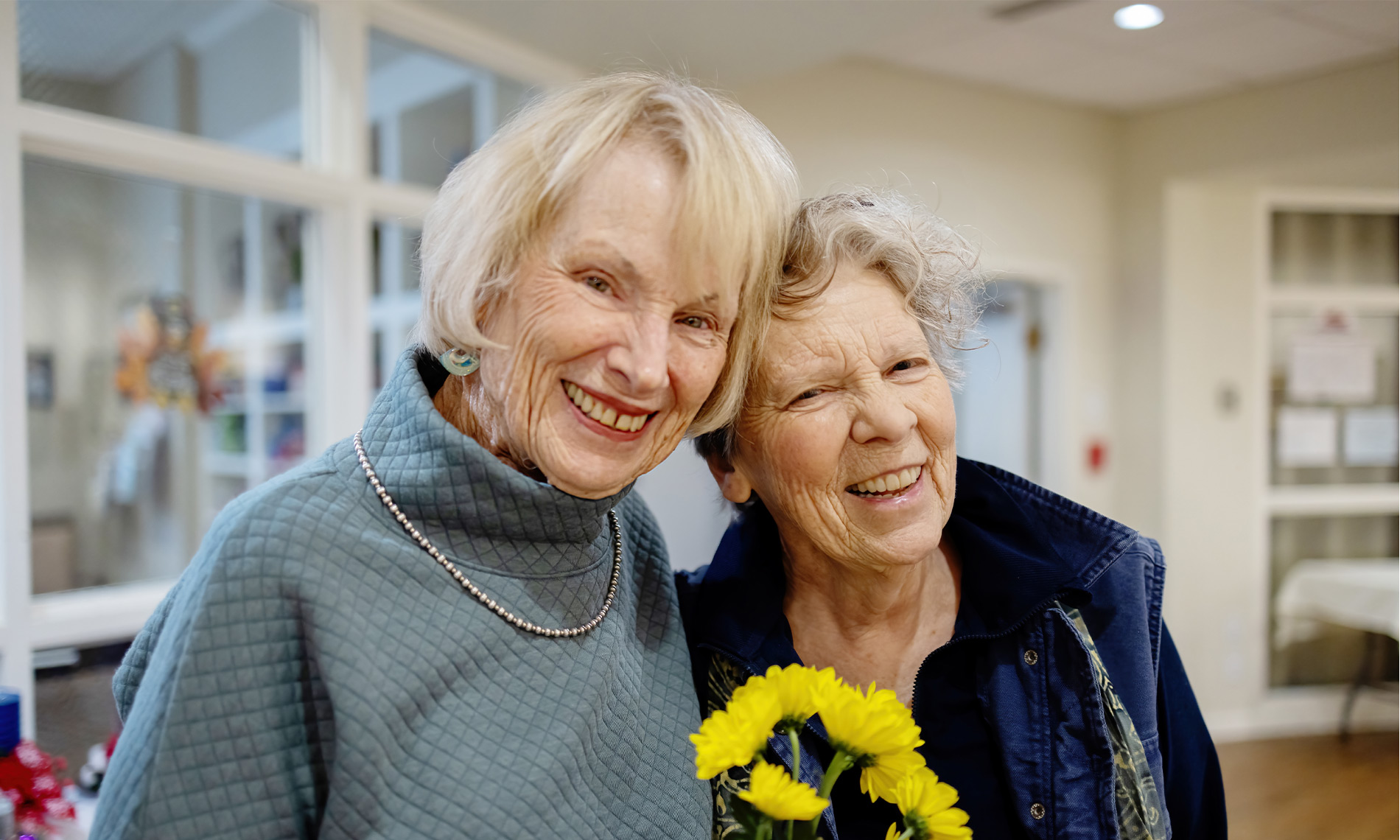 Two people smiling.