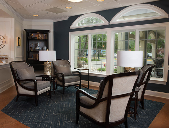 Seating area by windows.