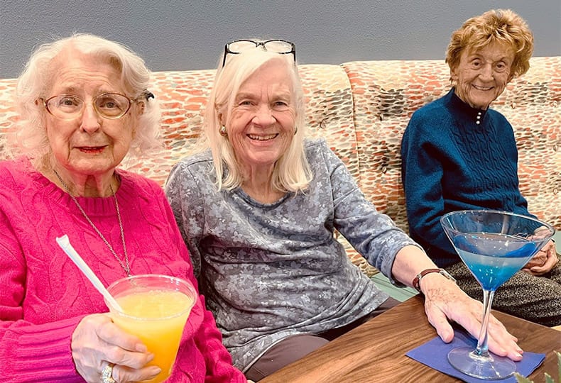 The Fountains at the Albemarle Happy residents enjoying drinks.