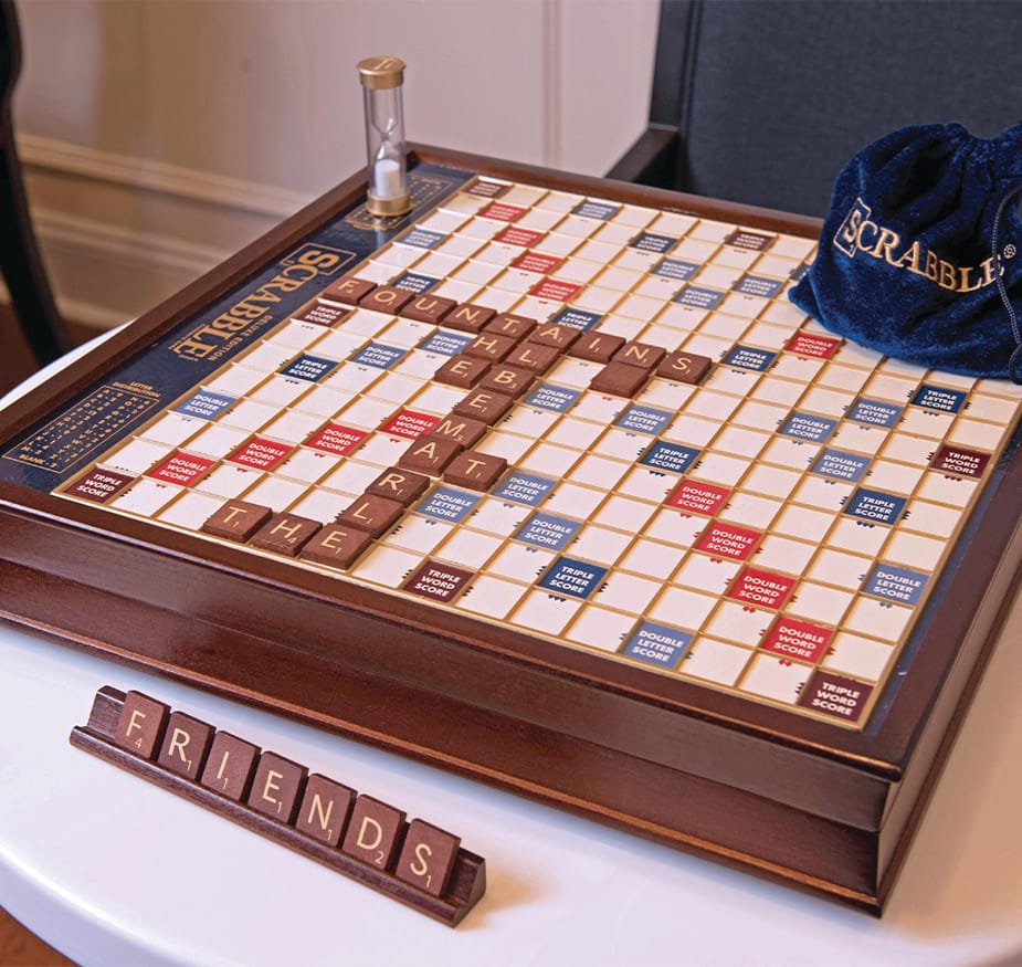 The Fountains at Albemarle A scrabble board sitting atop a table.