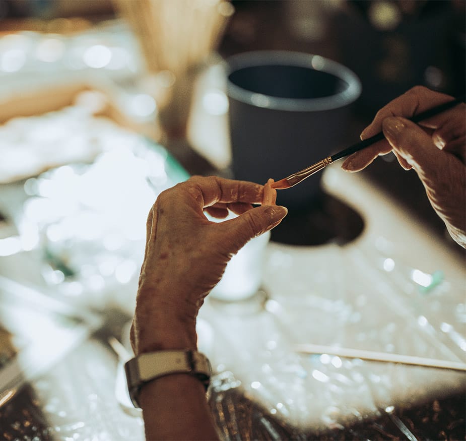 The Fountains at Albemarle Signature Programs A resident painting.