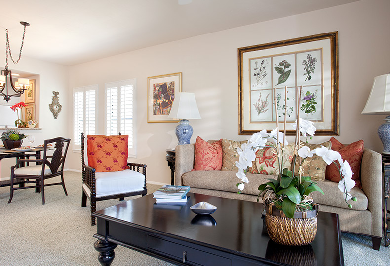 living room space with sofa, coffee table and dining room table and chairs