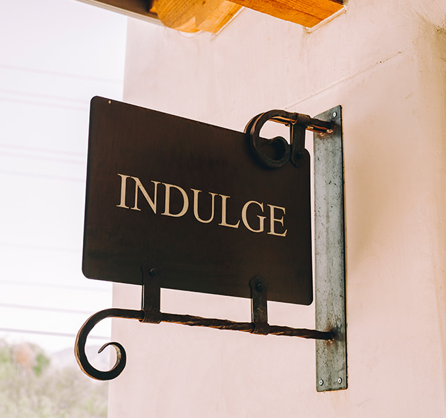 Indulge spa sign.