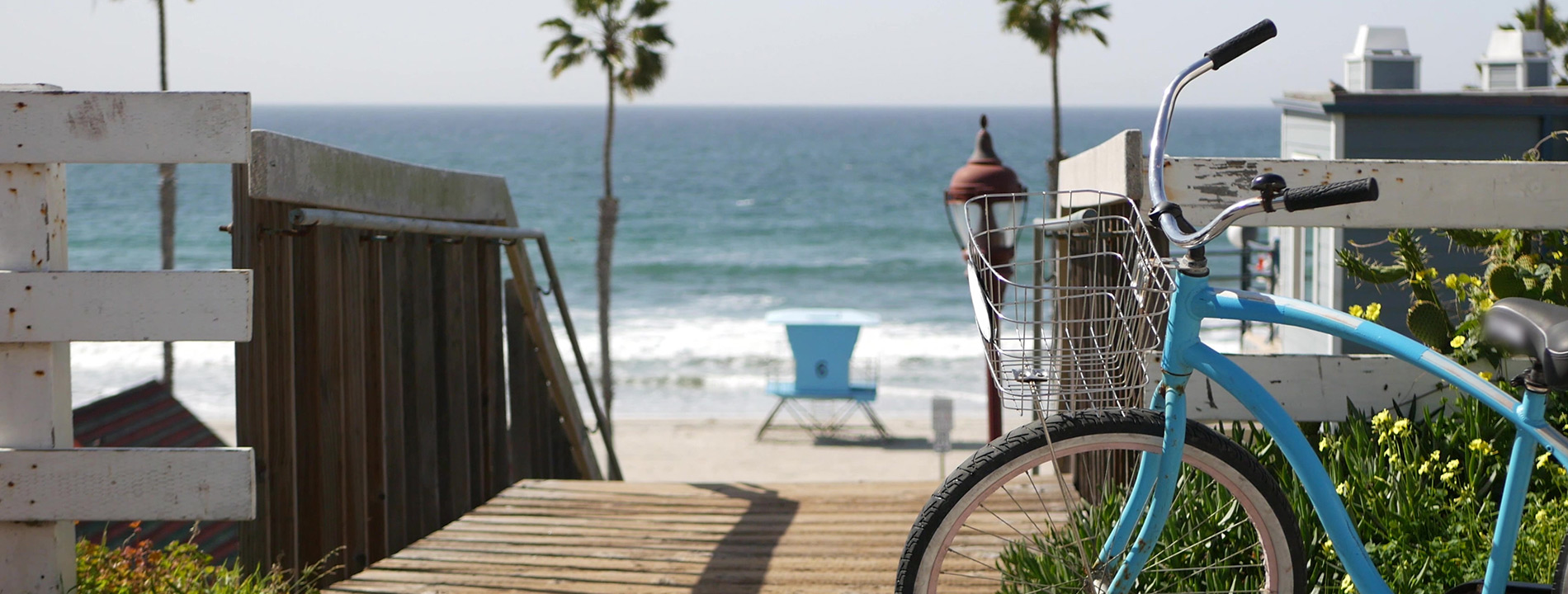 Bike parked by beach.