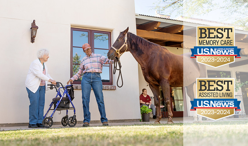 A wrangler with a horse visiting a resident.