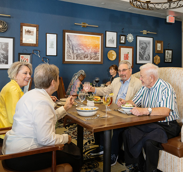 Two couples at the Acacia eating dinner or lunch.