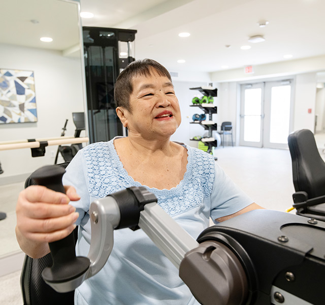 A person working out at the gym.